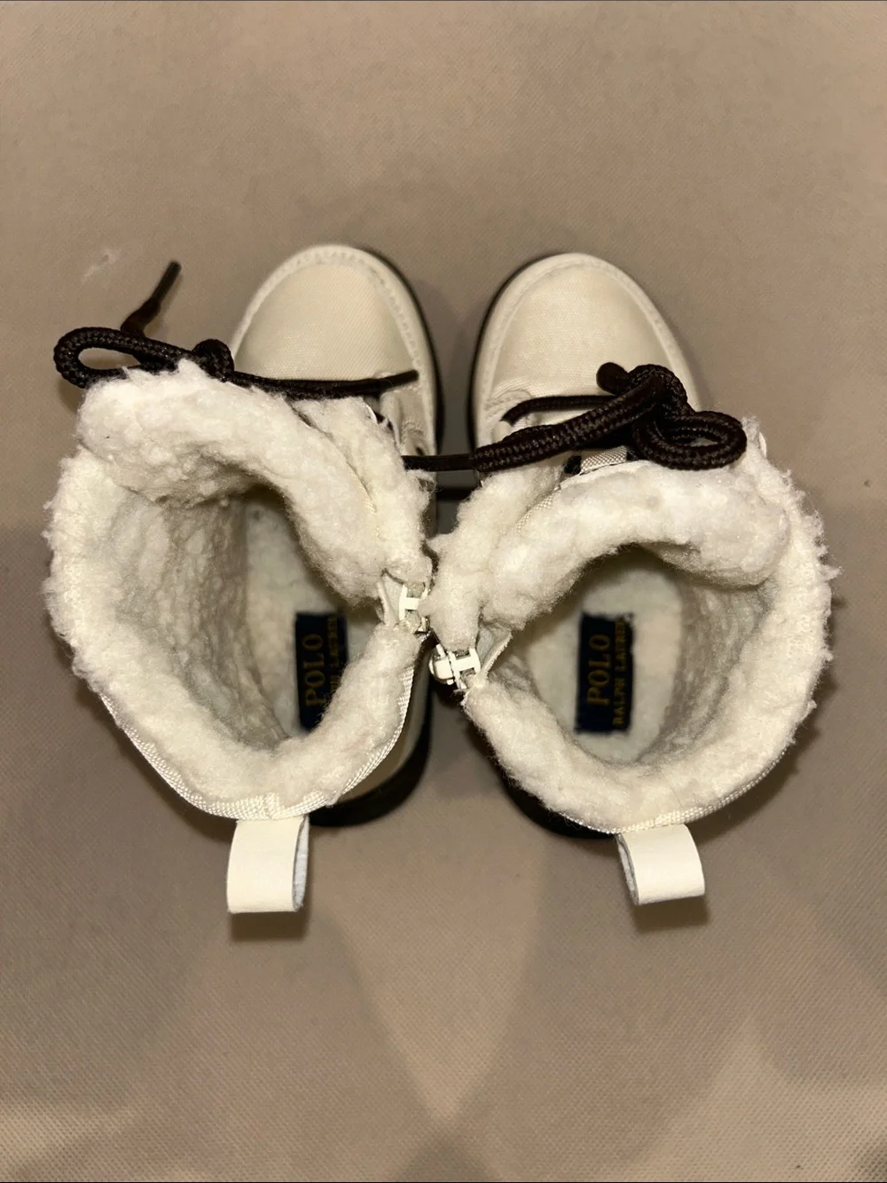 Polo Ralph Lauren Girl’s snow boots featuring a white nylon upper, Size 8